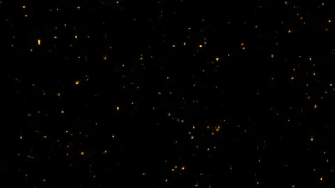 Loop glow gold star particles flow to top right background Stock Footage 298910132