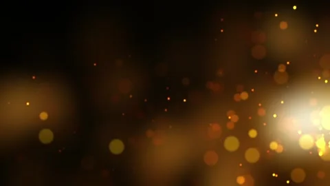 Loop gold particles and bokeh on black abstract background Stock Footage 313530457