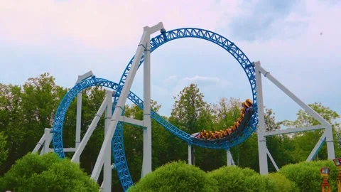 Loop metal frame of a roller coaster in an amusement park Stock Footage 295945100