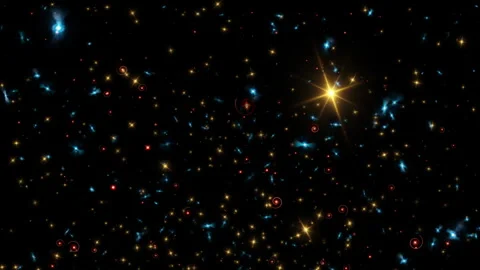 Loop orange red blue particles flow up on black background Video stock 285227942