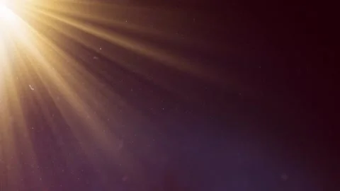 Loop of rays glow orange gold optical flare shine light from the top left Stock Footage 280299625