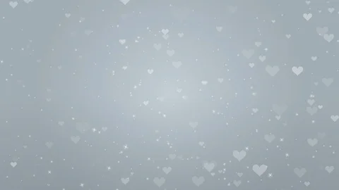 Loop ready file - Rising particle motion background, heart shape, Silver Stock Footage 123563001