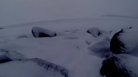 Loop: Snow blowing in from lake, slow motion Stock Footage 20829796