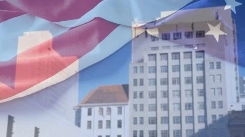 On loop start sheer flag overlaying building, rippling right, blending patriotic Stock Footage 333193489