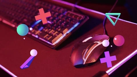 Loop starting 3D shapes drifting over wired gaming mouse, rotating and 库存影片 335465499