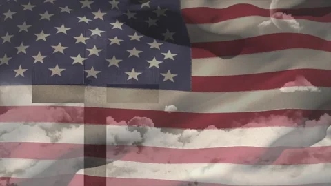 Loop starting, US flag rippling and folding while clouds drifting, cross overlay 库存影片 329832930
