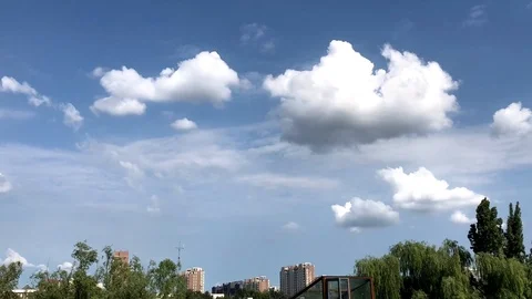 Loop of A static timelapse of small city with cloudy sky passing through Stock Footage 125591825