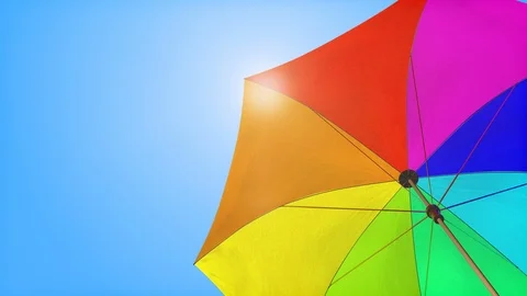 Loop: Sun umbrella under summer sky Stock Footage 91495765