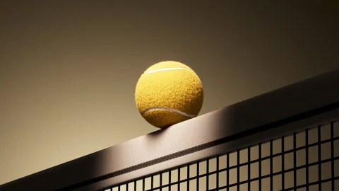 Loop Tennis ball perched on net post rolling and settling under dramatic warm Stock Footage 347891518