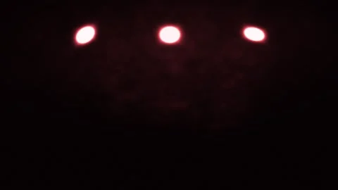 Loop three light sources in a red fog Stock Footage 317219484
