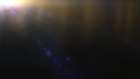 Loop top left glod blue optical flares on black background Stock Footage 273185130