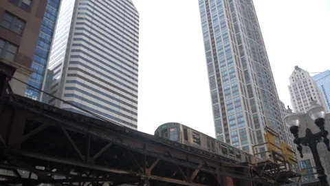 The Loop train and tall buildings, Chicago, Illinois, United States of America, Stock Footage 118521519