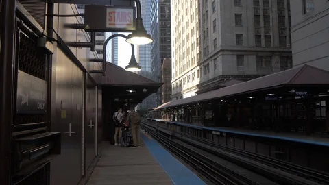 Loop train arriving at station, Chicago, Illinois, United States of America, Stock Footage 118528011