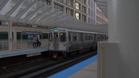Loop train arriving at station, Chicago, Illinois, United States of America, Stock Footage 118528128