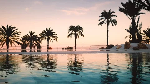 Loop Video / Amazing pool at a Luxury resort, Beach Club Color Grading 4K Stock Footage 125023767