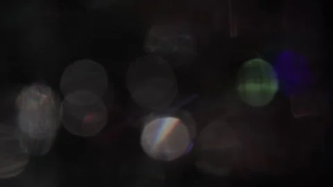 Loop video background of colorful blurred bokeh lights on black screen Vídeo Stock 317478899