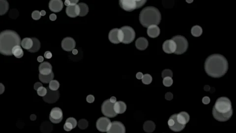 Loop White circles bokeh particles abstract background on black background. Stock Footage 277793100