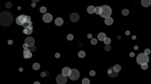 Loop White circles bokeh particles abstract background on black background. Stock Footage 277793108