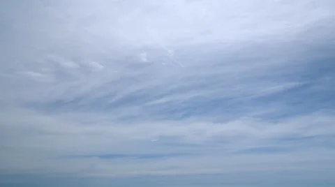 Loop of white clouds on blue sky. Time-lapse motion background 1080p Video stock 21989240