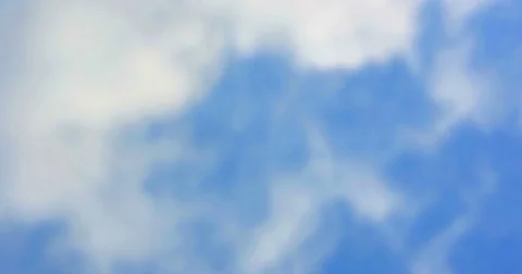 Loop of white clouds over blue sky, nature background Stock Footage 75336872