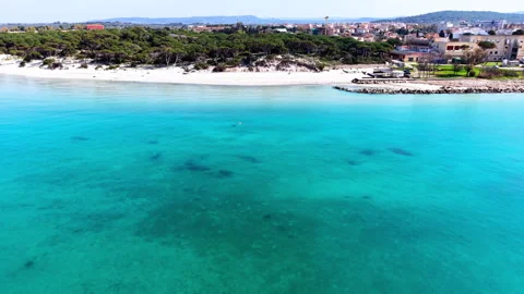 Loopable aerial view of Maria Pia beach seen from the water Stock Footage 337188790