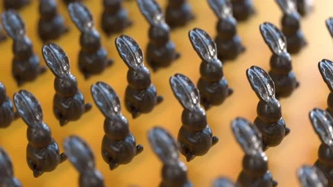 Loopable animation of cute chocolate jumping Easter bunnies.  Happy Easter. Stock Footage 158246342