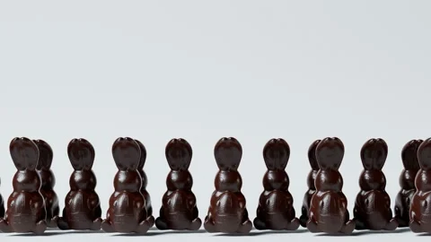 Loopable animation of cute chocolate jumping Easter bunnies.  Happy Easter. Stock Footage 158246649