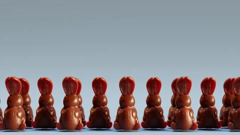 Loopable animation of cute chocolate jumping Easter bunnies.  Happy Easter. Stock Footage 201130645