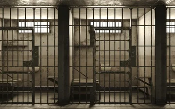 Loopable animation of dark cinematic prison cell block. Stockbeeldmateriaal 85479986