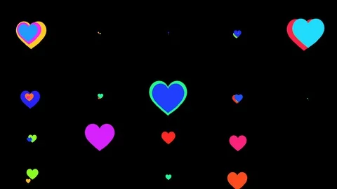 Loopable animation moves multicolored as heart icons on a black background. 库存影片 128733100