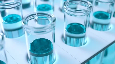 Loopable animation of test tubes filled with cyan blue liquid. Side view. 4KHD Stock Footage 126239975