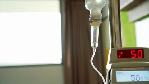 Loopable Cinemagraph Video. Close up saline solution drip for patient Stock Footage 86897445