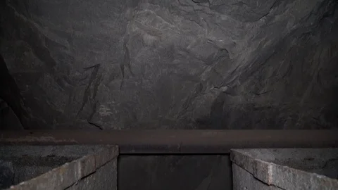 Loopable footage of mine wagons full of ore in dense smoke Stock Footage 97158637