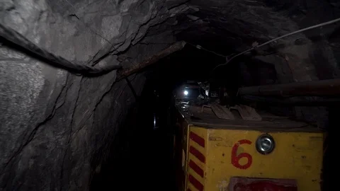 Loopable footage of mine wagons full of ore in dense smoke Stock Footage 97159210