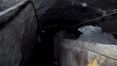 Loopable footage of mine wagons full of ore in dense smoke 库存影片 97159380