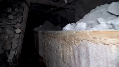 Loopable footage of mine wagons full of ore in dense smoke Stock-Footage 97159841