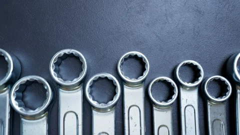 Loopable footage of various sizes of combination wrenches. Iron. Garage. Repair Video stock 133445197