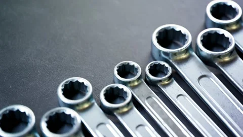 Loopable footage of various sizes of combination wrenches. Iron. Garage. Repair Video stock 133445309