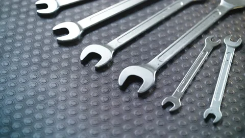 Loopable footage of various sizes of wrenches. Garage tools. Car mechanic. 4K HD Video stock 133443280
