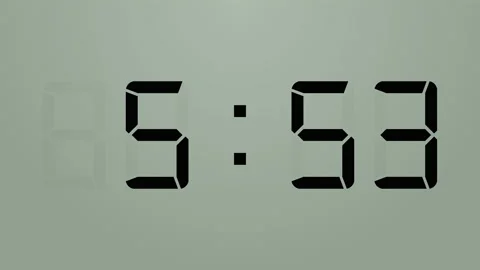 Loopable: LCD Digital Clock Displays Current Time in 24-Hours > Format Updating Stock Footage 148389252