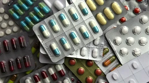Loopable medication turning Stock Footage 6749515