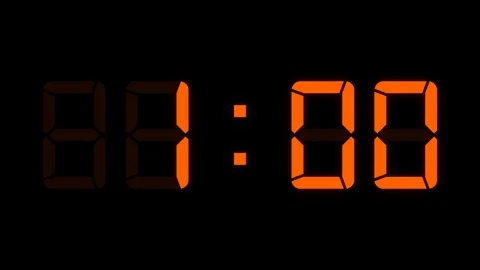 Loopable: Orange LED Digital Clock Displays Current Time in 24-Hours > Format Stock Footage 125231263