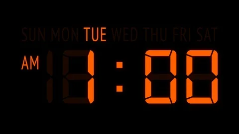 Loopable: Orange LED Digital Clock Displays Current Time at Tuesday in 12-Hours Stock Footage 126803447