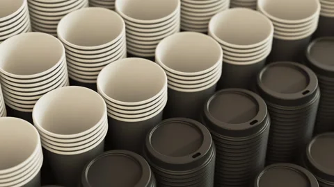 Loopable pan over a stack of disposable coffee or tea plastic cups and lids Stock Footage 292266132
