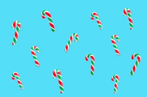 Loopable pattern of lollipops on a pastel blue background, a Christmas concept Foto stock
