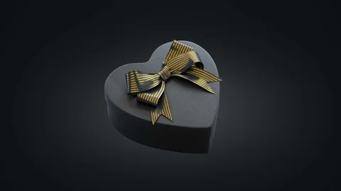 Loopable spin of heart shaped gift box Stock Footage 83895573