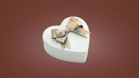 Loopable spin of heart shaped gift box Stock Footage 84154111