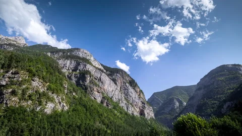 Loopable timelapse of clouds passing over monte pedido mountains Stock Footage 160761883