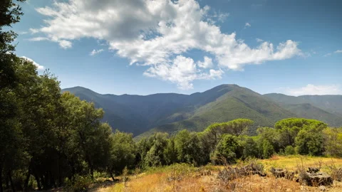 Loopable timelapse of clouds passing over montseny Stock Footage 160851654