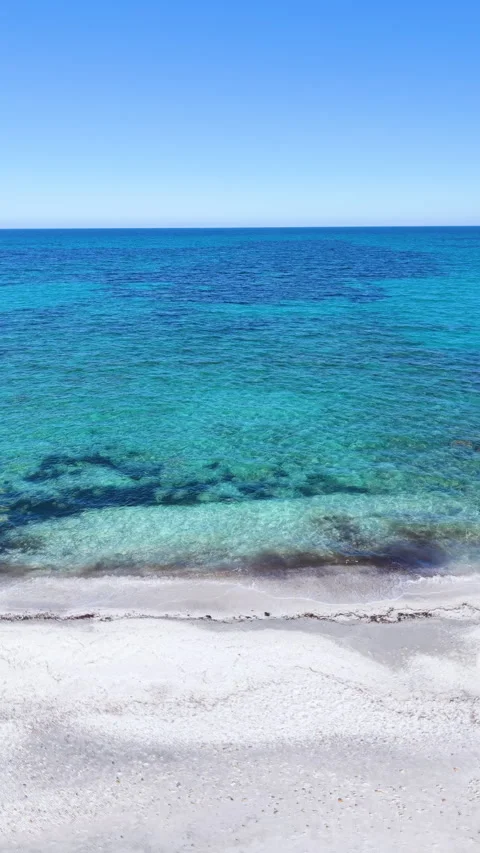Loopable vertical aerial view of a Sardinia beach Stock Footage 332662211